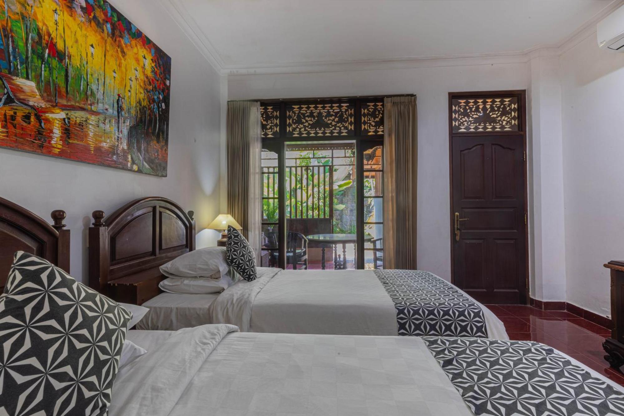 Puri Mango Guest House Sanur 外观 照片